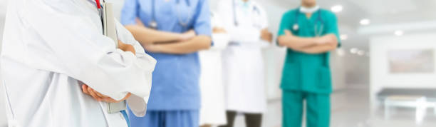 istock Doctor working in hospital with other doctors. 1092469698