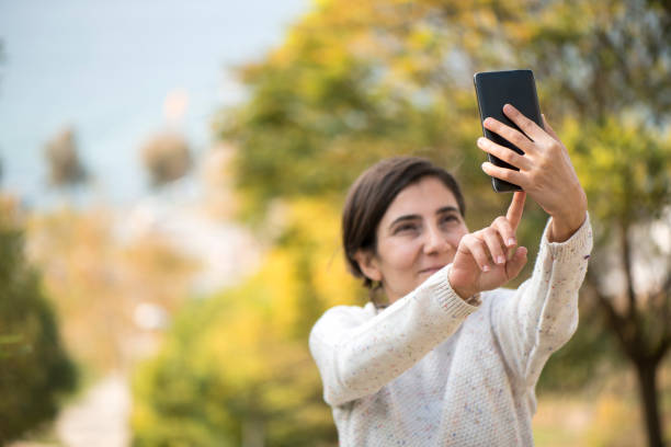 istock Woman Taking A Selfie 1092470396