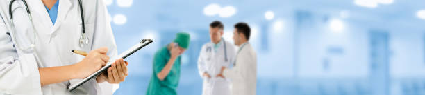 istock Doctor working in hospital with other doctors. 1092470670