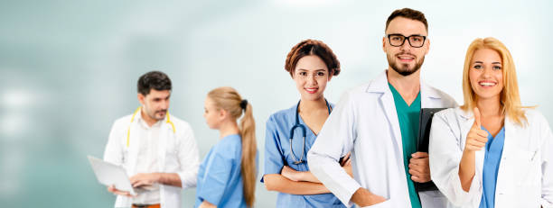 istock Doctor working in hospital with other doctors. 1092470720