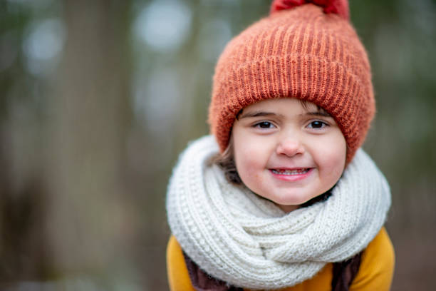 istock Smiling girl wearing a scarf 1092477604