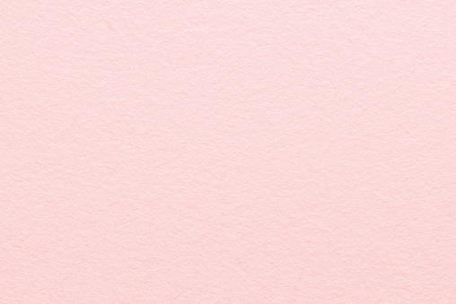 Close up pastel pink paper texture for wrapping and background. Pink paper texture