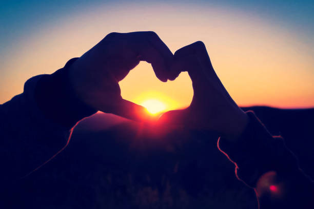 istock heart hand silhouette love shape 1092484124