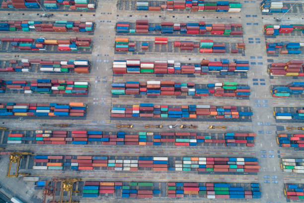 istock Logistics and transportation of Container Cargo ship and Cargo working crane bridge in shipyard 1092484576