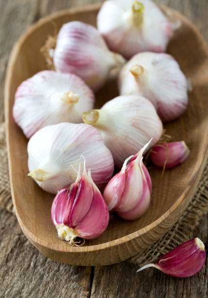 istock fresh garlic on wooden surface 1092499838