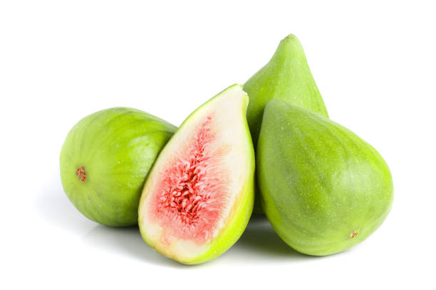 istock Ripe green fig fruit and half isolated on white background 1092504030