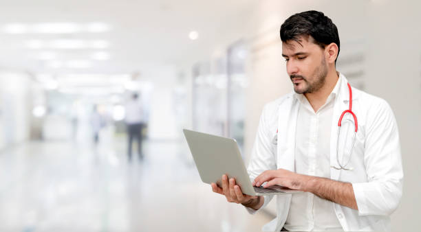 istock Doctor using laptop computer at the hospital. 1092510076