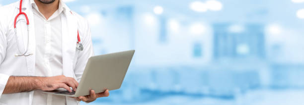 istock Doctor using laptop computer at the hospital. 1092510118