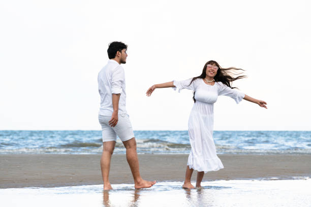 istock Couple going honeymoon on tropical beach in summer 1092510408