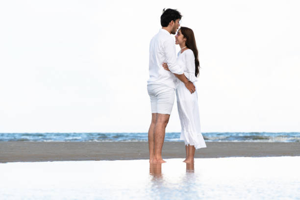 istock Couple going honeymoon on tropical beach in summer 1092510432