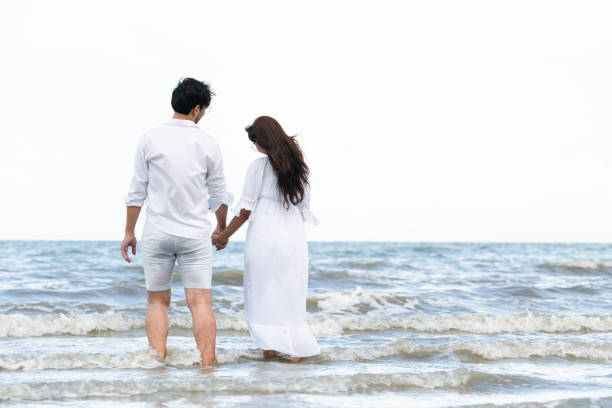 istock Couple going honeymoon on tropical beach in summer 1092510546