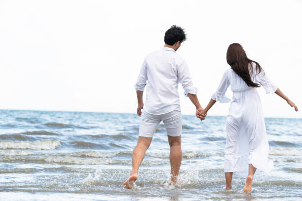 istock Couple going honeymoon on tropical beach in summer 1092510550