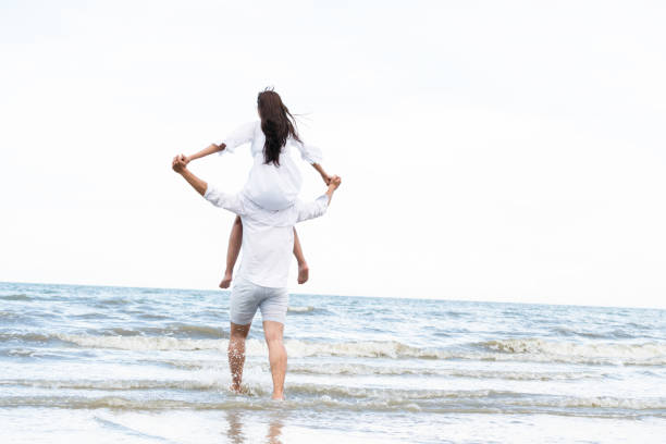 istock Couple going honeymoon on tropical beach in summer 1092510564