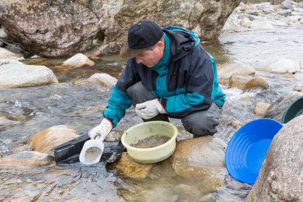 istock Adventures on the river. Modern alluvial gold prospector 1092517604