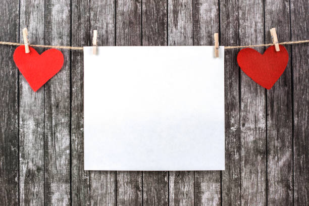istock Valentine's hearts with empty piece of paper. 1092517788