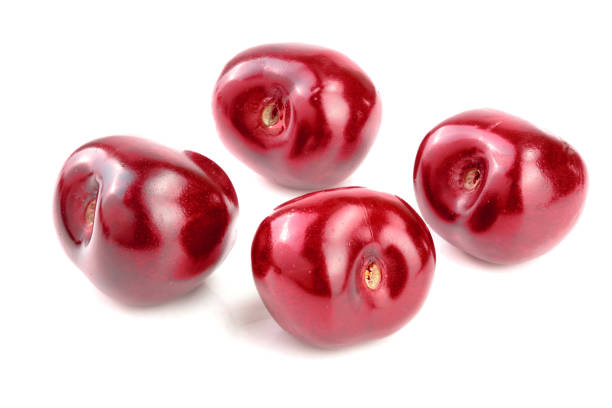istock Sweet red cherries isolated on white background macro 1092521478