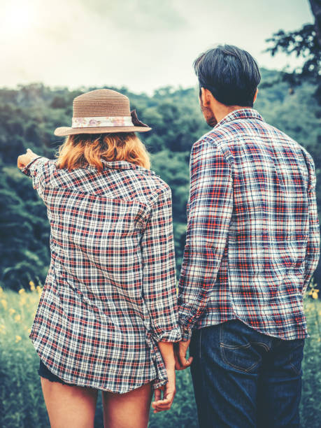 istock Happy couple take a romantic walk on the hills. 1092524436