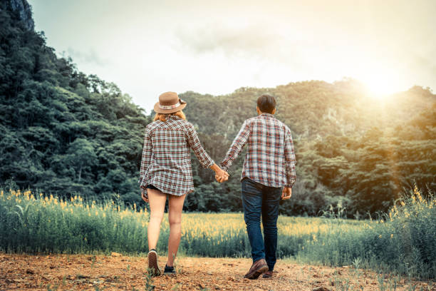 istock Happy couple take a romantic walk on the hills. 1092524440