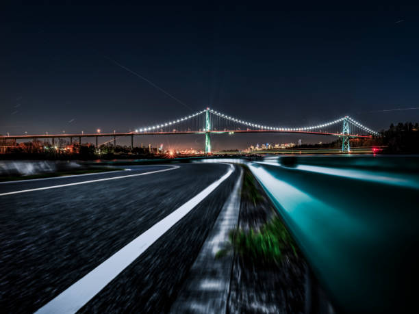 istock motion blur road with Lions Gate Bridge on background in Vancouver BC Canada 1092526590