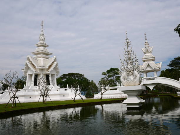 wat rong khun temple of chiang rai, thailand - rong river khun wat thailand stock-fotos und bilder