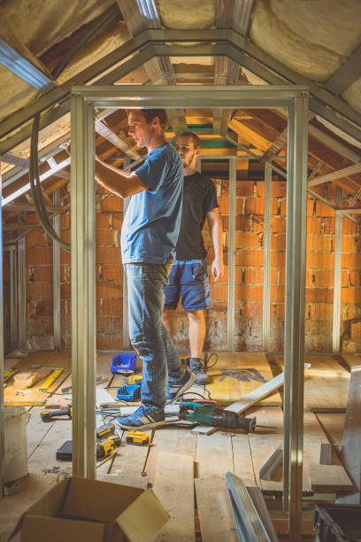 istock Men renovating an attic 1092539446