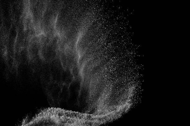 congelar el movimiento de las partículas blancas sobre fondo negro. - speed snow textured textured effect fotografías e imágenes de stock