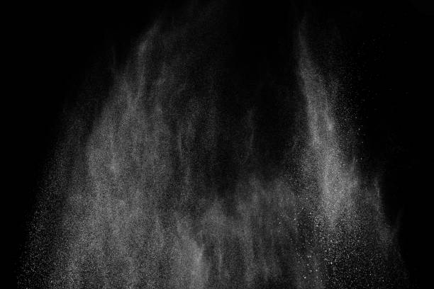istock Freeze motion of white particles on black background. 1092564166