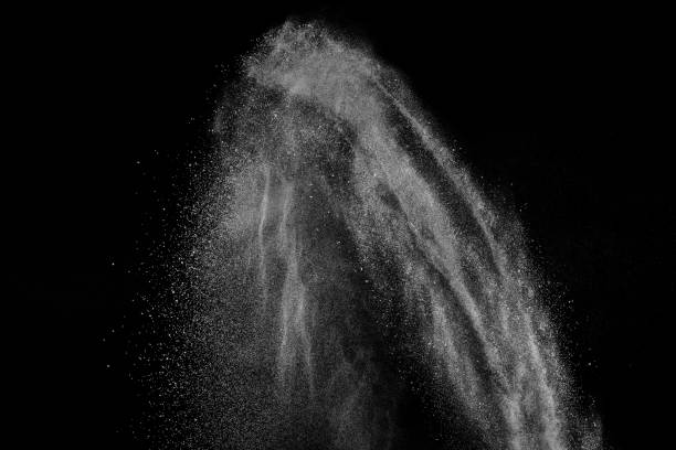 istock Freeze motion of white particles on black background. 1092564188