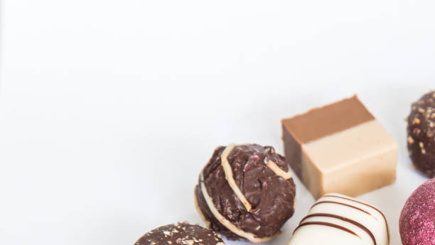 istock Chocolate pralines truffles with empty space for text. 1092570662