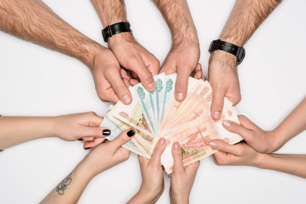 istock partial view of group sharing Russian banknotes isolated on grey 1092572492
