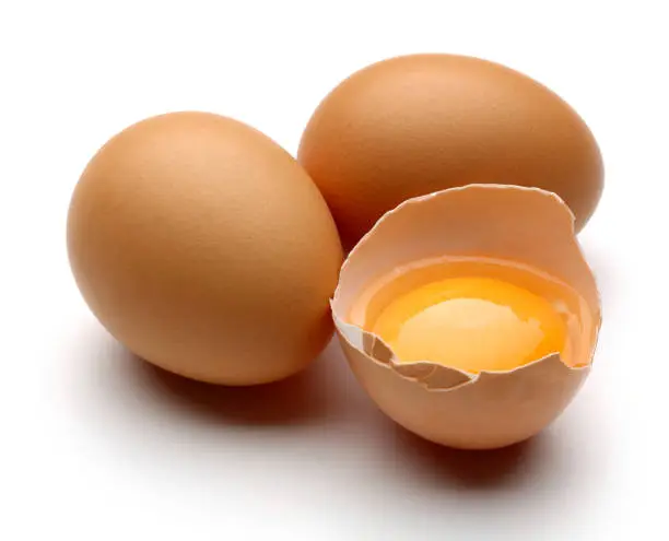 Photo of Broken egg on white background