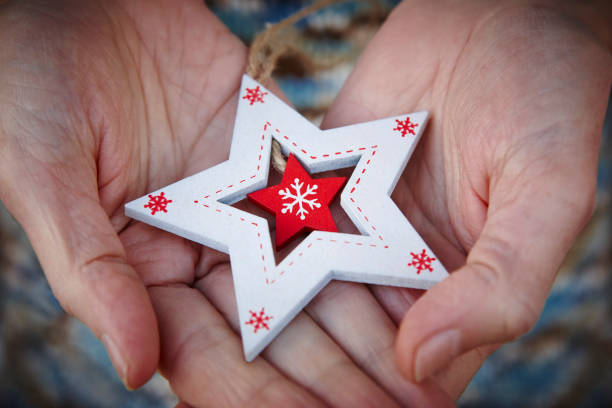 istock Handcrafted wooden christmas stars. Tenderness between elderly people. Horizontal 1092578006