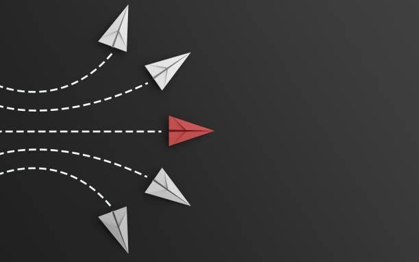 istock leadership or different concept with red and white paper airplane path and route line on black background. Digital craft in education or travel concept. Mock up design. 3d abstract illustration 1092581370
