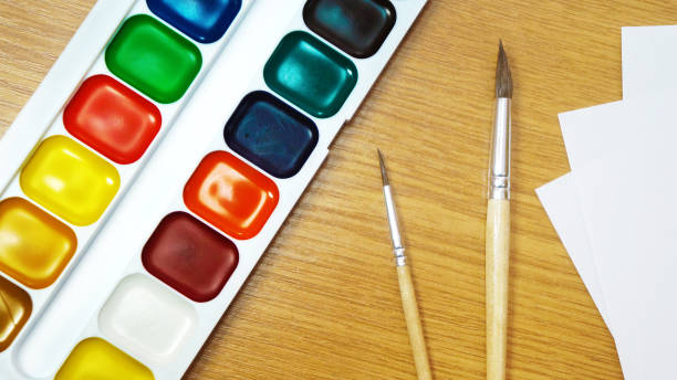 istock Watercolors paints and brushes 1092581454