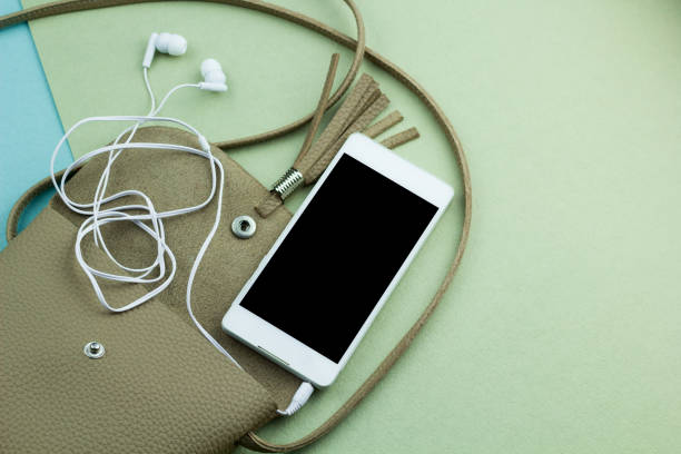 istock phone mock up black screen   and earphones in an open bag 1092589982