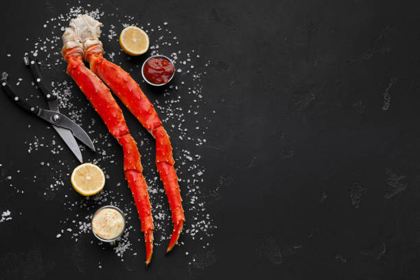 istock Delicious king crab legs with eating tools top view 1092594382