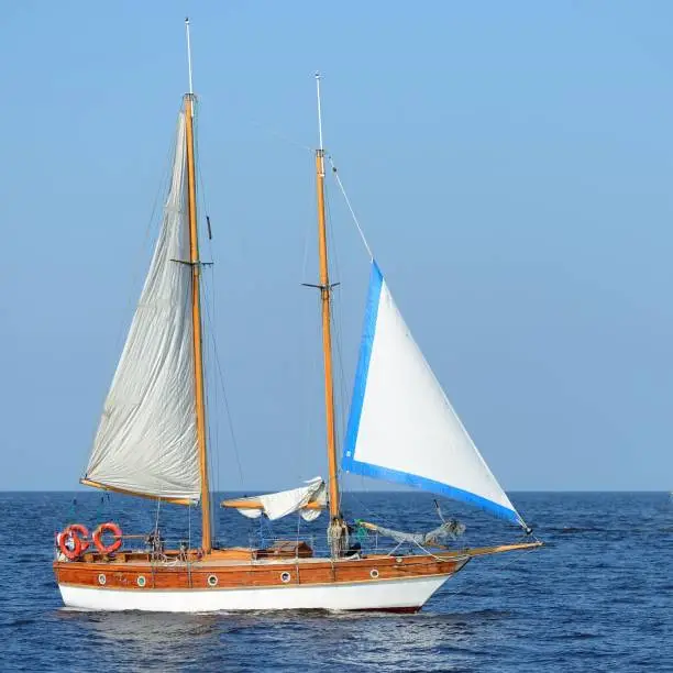 Sailship in the open sea on a sunny summer day