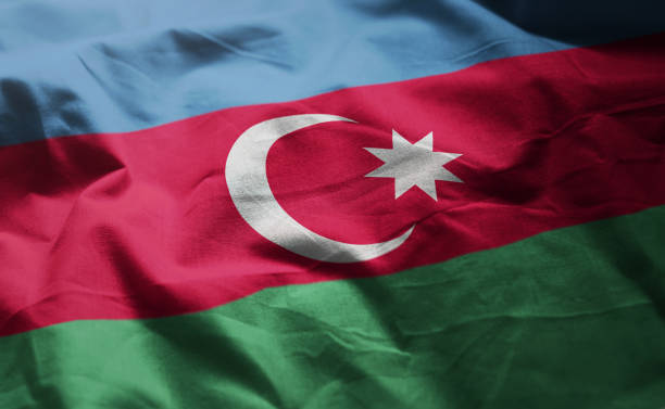 aserbaidschan-flagge zerknittert hautnah - azerbaijan flag stock-fotos und bilder