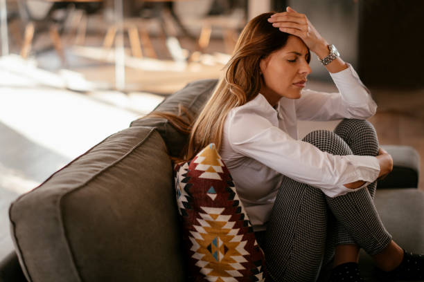 istock Woman with a stomach ache 1092606370