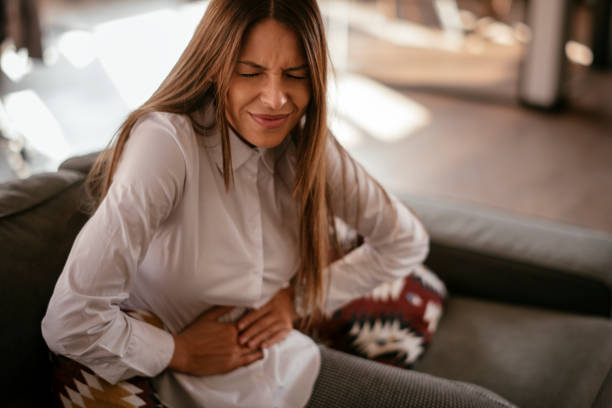 istock Woman with a stomach ache 1092607682