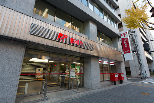 Osaka, Japan - December 15, 2018 : Post Office in Osaka Prefecture, Japan. Japan Post offering postal and package delivery services, banking services and life insurance.