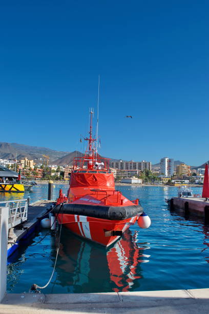 Los Cristianos, Tenerife / Spain - December 22, 2018 : Coast Guard rescue boat moored in the port of Los Cristianos