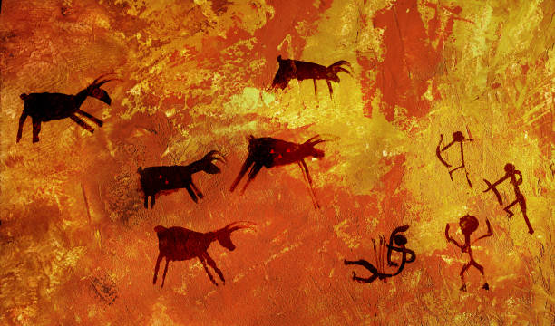 группа первобытных людей охотится на стадо копытных животных оленей и лосей - prehistoric era stock illustrations