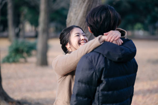 istock Couple embracing each other in Park 1092620616
