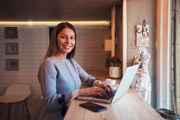istock Female freelancer at cafe 1092621006