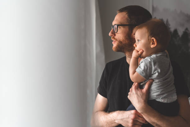 istock Stay at home father with his baby son 1092621236