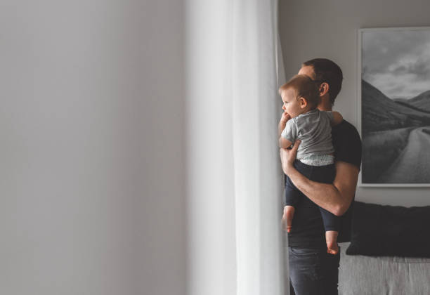 Stay at home father with his baby son