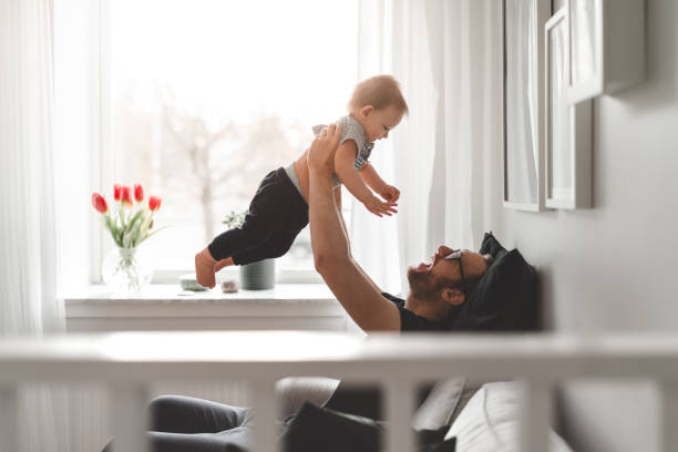 Stay at home father with his baby son