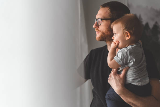 istock Stay at home father with his baby son 1092621258
