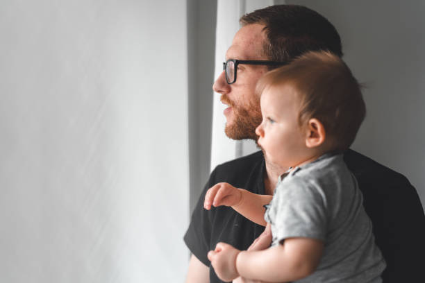 istock Stay at home father with his baby son 1092621270